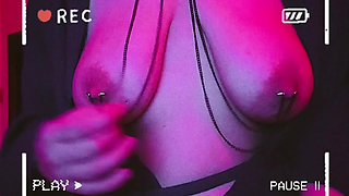 Sexy MILF Plays with Pierced Boobs