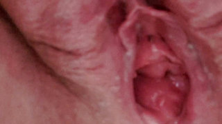 Pissing in close up with open pussy
