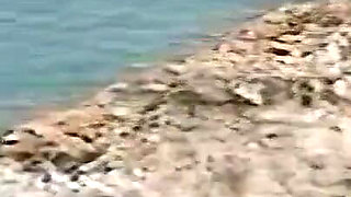 Horny Redhead Babe Fingers Pussy on Wild Beach