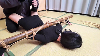 Xr40-a Girl in Black Stocking Is Tied to a Cross