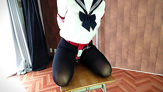 A Woman Is Being Punished While Wearing a Vibrator-equipped Chastity Belt.