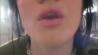 Slutty teens smoking a cigarettes in close up video
