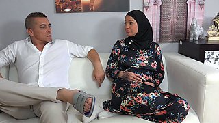 Caring wife in hijab wants to please her husband