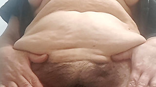 Mom recording herself wearing only a t-shirt