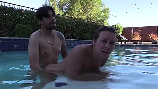 Amateur MILF Splashing in Pool with Dildo Blowjob