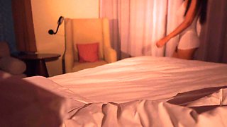 Coming to the hotel room, the stepsister immidiately wants to test the bed.