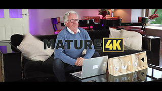 MATURE4K. April Velvet used her amazing tits to milk her neighbour's big cock, while husband was sitting next door