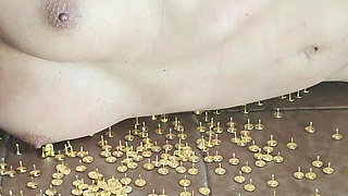 Masochistic Slave Having an Orgasm While Lying on Thumbtacks