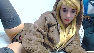 Blonde teen in solo action with her pussy