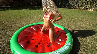 Busty babes in bikini at the pool, getting frisky