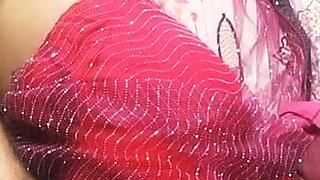 Beautiful Indian Bhabhi in Red Colour Saree.