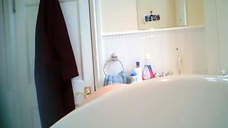 Blonde curvy stepmom peeped at in bathroom