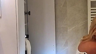 Big Ass Blonde Beauty Takes off Her Panties Braless in the Bathroom Flashes Her Tight Shaved Pussy