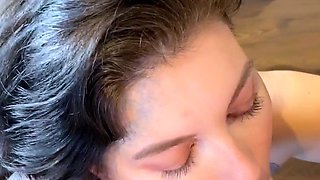 Busty curly brunette with big boobs fucks on couch