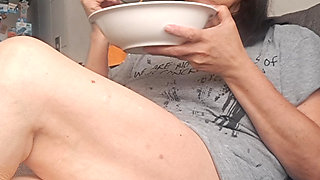MILF eating with legs open