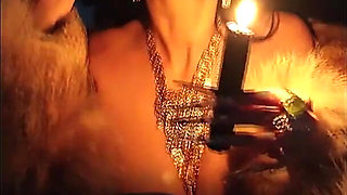 A Gothic Witch Seduces You During a Winter Snowstorm with Her Black Magic Rituals, Long Nails and Fur.