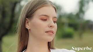 Yana Femjoy Strips Big Tits in Outdoor Teen Tease