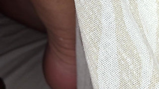 Step mom hand goes under step son leg and grabs his big balls and squeeze them hard