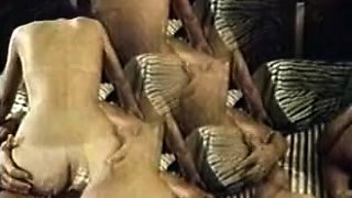 Two teasing brunette lesbians lick each others honey pot