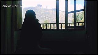 Arab milf’s risky window play with smoking allure