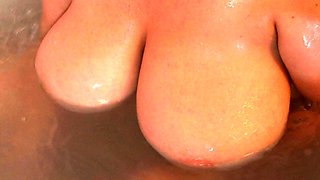 Tanned pussy licking lesbians with big boobs playing on bed