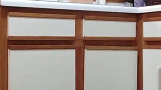 Buttcrack reveal unloading dishwasher