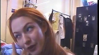 Hot dominatrix in leather with a great body puts a guy in clamps