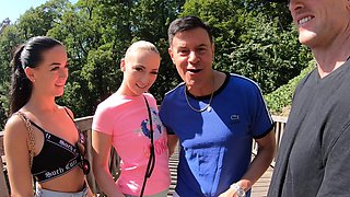 Two girls having fun with a guy in the forest, wild threesome