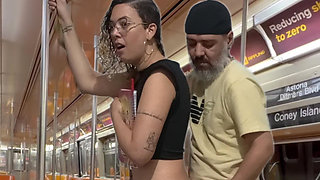 Student girl gets cum on New York subway train.