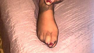 Feet in Pantyhose and Red Nail Polish for a Super Cumshot
