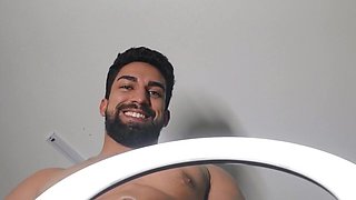 Bearded man making an OnlyFans video with his partner