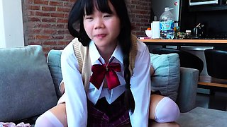 Asian schoolgirl gets on top and then gets fucked doggy