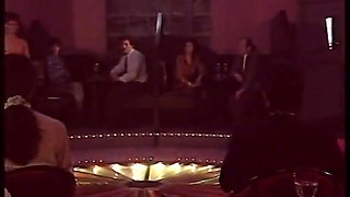 Blonde stripper bends showing shaved pussy