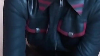 Latex Danielle plays in latex costume with his cock