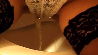 Toilet Pissing Through Lace