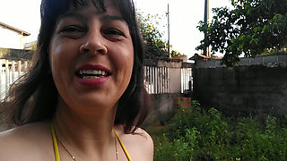 Amateur wife teasing you outside wearing a micro bikini