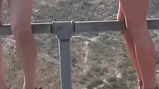Three Girls in Bikinis on a Mountain Top Get Naked and Play with Each Other