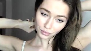 Beautiful teen brunette Jessica Sinn masturbates