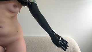 Hot Domme Redhead Teases in Latex Opera Gloves and Thigh High Boots