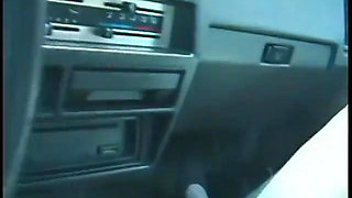 Commuter redhead carpools with creep who debases her in car in city traffic