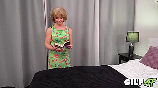 Alluring mature blonde ignites lingerie fantasy with tender oral delight