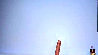 Cute amateur teen girl toying her pussy in bed on cam