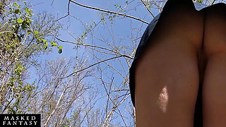 Beautiful Woman Undressing and Walking Nude with a Clit Pump Outdoors in a Public Forest