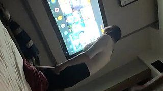 Cute amateur asian web cam girl playing with her toy
