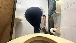 Careless Nurse Is Filmed in Public Restroom in Office