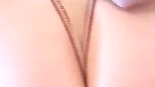 Pornstar Kitty Li in a Beautiful Leather Corset Has Fun Masturbating