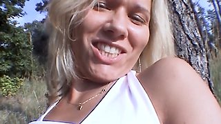 Deep throat blonde hitchhiker Nancy Reegan offers a wild outdoor handjob