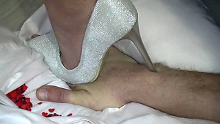 Step with the heel on your hand