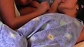 Lesbian in Bed in the Morning with Fingers Licking Double Dildo