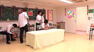 The teacher is fingered until she squirts repeatedly and gets bukkake on her face.